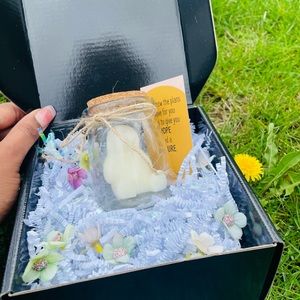 scented candles , a prayer card with a cute jar reusable & cleansing bad aura